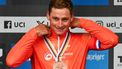 Third-placed Netherlands' Mathieu van der Poel celebrates during the podium ceremony of the men's Elite Road Race cycling event as part of the UCI 2024 Road World Championships, in Zurich, on September 29, 2024. 
Fabrice COFFRINI / AFP