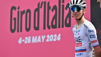 epa11319454 Slovenian rider Tadej Pogacar of UAE Team Emirates looks on during the sign in ahead of the second stage of the Giro d'Italia 2024, a 161km cycling race from San Francesco al Campo to Santuario di Oropa (Biella), Italy, 05 May 2024.  EPA/LUCA ZENNARO