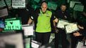 Netherlands' Michael van Gerwen makes his way to the stage ahead of playing against England's Luke Littler in the PDC World Darts Championship final, at Alexandra Palace in London on January 3, 2025. 
Ben STANSALL / AFP