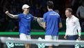 2023-11-25 20:12:04 Italy's Jannik Sinner (L), Lorenzo Sonego (C) and Italy's captain Filippo Volandri celebrate after winning against Serbia's Novak Djokovic and Momir Kecmanovic during the men's doubles semifinal tennis match between Italy and Serbia of the Davis Cup tennis tournament at the Martin Carpena sportshall, in Malaga on November 25, 2023. 
LLUIS GENE / AFP