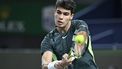 2023-10-11 13:56:16 Spain's Carlos Alcaraz hits a return to Bulgaria's Grigor Dimitrov during their men's singles match at the Shanghai Masters tennis tournament in Shanghai on October 11, 2023. 
WANG Zhao / AFP