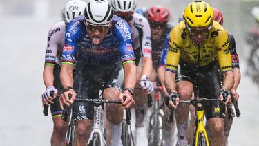 Alpecin-Premier Tech's Dutch rider Mathieu van der Poel (L) and Team Visma-Lease a Bike's French rider Christophe Laporte cycle in the men's race of the 'Ronde van Vlaanderen/ Tour des Flandres/ Tour of Flanders' UCI WorldTour one day cycling race, 278 km from Antwerp to Oudenaarde, in Haaltert on April 5, 2026. 
DAVID PINTENS / Belga / AFP