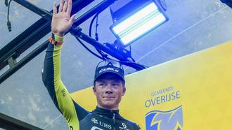 Dutch Jelte Krijnsen of Q36.5 Pro Cycling Team celebrates on the podium after winning the Druivenkoers one-day cycling race, 206,3 km from and to Overijse, on August 23, 2024. 
MARC GOYVAERTS / Belga / AFP