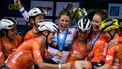 Dutch rider Demi Vollering celebrates with her teammates on the podium after winning the women 2025 UEC European road cycling championship, around Valence, on October 4, 2025. 
JEFF PACHOUD / AFP