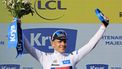epa11489502 Belgian rider Remco Evenepoel of Soudal Quick-Step celebrates on the podium wearing the best young rider's white jersey following the end of the 20th stage of the 2024 Tour de France cycling race over 132km from Nice to Col de la Couillole, France, 20 July 2024.  EPA/GUILLAUME HORCAJUELO