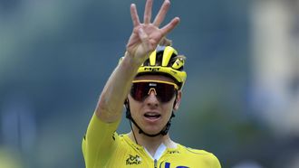 epa11487770 Yellow jersey Slovenian rider Tadej Pogacar of UAE Team Emirates celebrates as he crosses the finish line to win the 19th stage of the 2024 Tour de France cycling race over 144km from Embrun to Isola 2000, France, 19 July 2024.  EPA/GUILLAUME HORCAJUELO