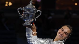 Belarus's Aryna Sabalenka poses with her trophy after defeating USA's Amanda Anisimova in the women's singles final tennis match on day fourteen of the US Open tennis tournament at the USTA Billie Jean King National Tennis Center in New York City on September 6, 2025. 
TIMOTHY A.CLARY / AFP