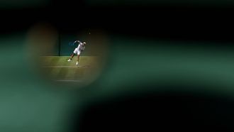Australia's Rinky Hijikata serves against Netherlands' Jesper de Jong during their men's singles first round tennis match on the second day of the 2026 Wimbledon Championships at The All England Lawn Tennis and Croquet Club in Wimbledon, southwest London, on June 30, 2026. 
Adrian Dennis / AFP