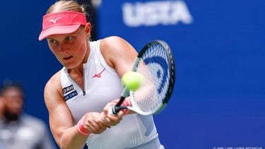 Netherlands' Suzan Lamens plays a return to Poland's Iga Swiatek during their women's singles second round tennis match on day five of the US Open tennis tournament at the USTA Billie Jean King National Tennis Center in New York City, on August 28, 2025. 
Kena Betancur / AFP