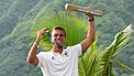 Gold medallist France's Kauli Vaast reacts in the mens surfing podium ceremony, during the Paris 2024 Olympic Games, in Teahupo'o, on the French Polynesian Island of Tahiti, on August 5, 2024. 
Jerome BROUILLET / AFP