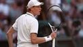 Italy's Jannik Sinner celebrates winning the third set against Germany's Alexander Zverev during their men's singles final tennis match on the fourteenth day of the 2026 Wimbledon Championships at The All England Lawn Tennis and Croquet Club in Wimbledon, southwest London, on July 12, 2026. 
Henry Nicholls / AFP