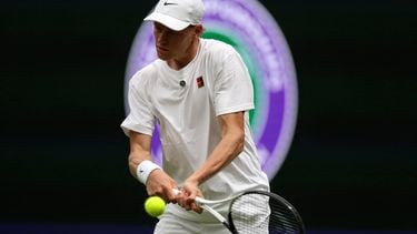Italy's Jannik Sinner reacts as he practices with Serbia's Novak Djokovic on No. 1 Court at The All England Lawn Tennis and Croquet Club in Wimbledon, southwest London, on June 25, 2026, ahead of the 2026 Wimbledon Championships. 
Adrian Dennis / AFP