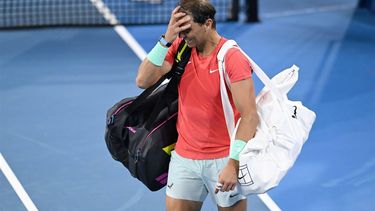 epa11050207 Rafael Nadal of Spain reacts after losing his doubles match with partner Marc Lopez of Spain against Max Purcell and Jordan Thompson of Australia during their round of 32 doubles match on Day 1 of the 2024 Brisbane International at the Queensland Tennis Centre in Brisbane, Australia, 31 December 2023.  EPA/DARREN ENGLAND  AUSTRALIA AND NEW ZEALAND OUT