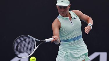epa11825286 Suzan Lamens of Netherlands in action during the Women's round 2 match against Belinda Bencic of Switzerland at the Australian Open tennis tournament in Melbourne, Australia, 15 January 2025.  EPA/ROLEX DELA PENA