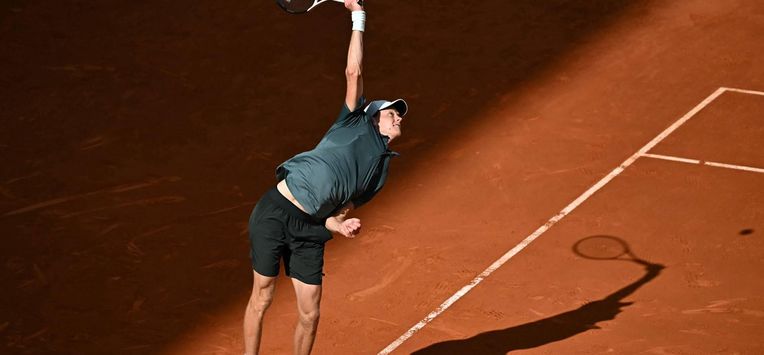 Italy's Jannik Sinner serves to France's Benjamin Bonzi during their 2026 ATP Tour Madrid Open tennis tournament second round singles match at the Caja Magica in Madrid, on April 24, 2026. 
Javier SORIANO / AFP