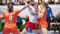 epa11738591 Denmark's Mie Enggrob Hoejlund (C) in action with Netherlands' Dion e Housheer and Lois Abbingh (L) during the Women'shandball match between Denmark and the Netherlands at the Golden League tournament in Viborg, Denmark, 24 November 2024.  EPA/Bo Amstrup DENMARK OUT