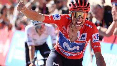 Team Movistar's Spanish rider Enric Mas celebrates his victory followed by Team Netcompany Ineos' Scottish rider Oscar Onley during the 9th stage of the Vuelta a Espana 2026 cycling tour, a 187,4 km race between Villajoyosa and Alto de Aitana in Confrides, on August 30, 2026.  
Josep LAGO / AFP