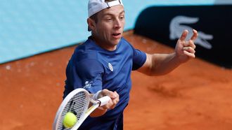 Netherlands' Tallon Griekspoor returns the ball to Denmark's Holger Rune during the third round of the 2024 ATP Tour Madrid Open tournament tennis match at Caja Magica in Madrid on April 28, 2024. 
OSCAR DEL POZO / AFP