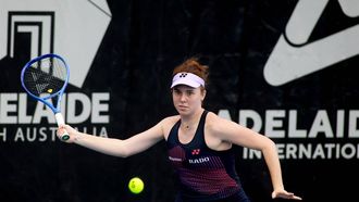 This handout photo released by Tennis Australia on January 7, 2025, shows Czech Republic’s Linda Noskova hits a return against Greece’s Maria Sakkari during their women's singles match at the Adelaide International tennis tournament in Adelaide. 
Kelly BARNES / TENNIS AUSTRALIA / AFP