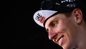 UAE Team Emirates team's Slovenian rider Tadej Pogacar smiles as he celebrates on the podium after winning the 117th edition of the Giro di Lombardia (Tour of Lombardy), a 238km cycling race from Como to Bergamo on October 7, 2023. 
Marco BERTORELLO / AFP