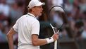 Italy's Jannik Sinner celebrates winning the third set against Germany's Alexander Zverev during their men's singles final tennis match on the fourteenth day of the 2026 Wimbledon Championships at The All England Lawn Tennis and Croquet Club in Wimbledon, southwest London, on July 12, 2026. 
Henry Nicholls / AFP