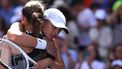 2023-09-01 20:32:14 Poland's Iga Swiatek embraces her best friend defeated Slovenia's Kaja Juvan during the US Open tennis tournament women's singles third round match at the USTA Billie Jean King National Tennis Center in New York City, on September 1, 2023. 
Kena Betancur / AFP