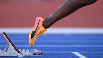 Jamaica's Rushell Clayton leaves the starting blocks as she competes during the women's 400m hurdles final athletics event at the Alexander Stadium, on day nine of the Commonwealth Games in Birmingham, central England, on August 6, 2022. 
Glyn KIRK / AFP