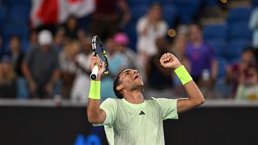 epa11079522 Felix Auger-Aliassime of Canada celebrates after winning his first round match against Dominic Thiem of Austria on Day 2 of the 2024 Australian Open at Melbourne Park in Melbourne, Australia, 15 January 2024.  EPA/LUKAS COCH  AUSTRALIA AND NEW ZEALAND OUT