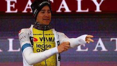 Team Visma–Lease a Bike's Belgian rider Cian Uijtdebroeks celebrates the best young rider's white jersey on the podium of the 10th stage of the 107th Giro d'Italia cycling race, 142km between Pompei and Cusano Mutri (Bocca della Selva), on May 14, 2024.  
Luca Bettini / AFP