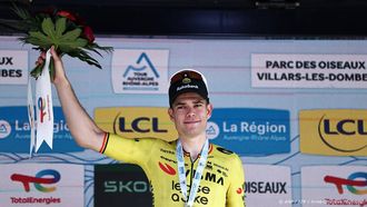 Stage winner Team Visma | Lease a Bike's Belgian rider Wout Van Aert celebrates on the podium of the 5th stage of the Tour Auvergne-Rhone-Alpes cycling race (formerly known as the Criterium du Dauphine), 195,8km between Saint-Chamond and Villars-les-Dombes, central France, on June 11, 2026. 
Anne-Christine POUJOULAT / AFP