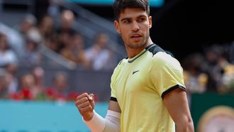epa11302849 Carlos Alcaraz of Spain celebrates a point during his men's singles match against Aleksandr Shevchenko of Kazakhstan at the Madrid Open tennis tournament, Madrid, Spain, 26 April 2024.  EPA/Chema Moya