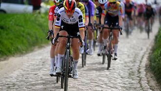 FDJ United-SUEZ's German rider Franziska Koch leads the pack on a cobblestone sector during the 6th edition of the Women Paris-Roubaix one-day classic cycling race, 143.1 km between Denain and Roubaix, northern France, on April 12, 2026.  
NICOLAS TUCAT / AFP