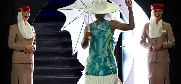 epa12664063 Naomi Osaka of Japan enters the court ahead of her Women’s Singles first round match against Antonia Ruzic of Croatia at the Australian Open tennnis tournament in Melbourne, Australia, 20 January 2026.  EPA/JOEL CARRETT  AUSTRALIA AND NEW ZEALAND OUT