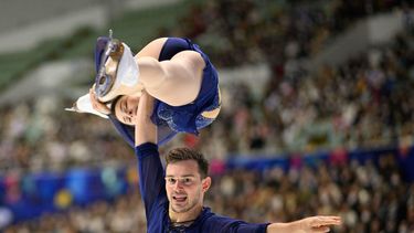Netherlands' Daria Danilova and Michel Tsiba compete in the pairs free skating during the NHK Trophy figure skating competition in Kadoma City, Osaka Prefecture on November 8, 2025.  
Philip FONG / AFP