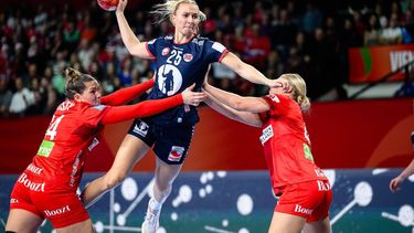 epa11779192 Rikke Iversen of Denmark (L) in action against Henny Ella Reistad of Norway (R) during the EHF Women's EURO 2024 final match between Denmark and Norway, in Vienna, Austria, 15 December 2024.  EPA/MAX SLOVENCIK
