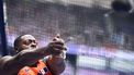 Netherlands' Denzel Comenentia competes in the men's hammer throw qualification of the athletics event at the Paris 2024 Olympic Games at Stade de France in Saint-Denis, north of Paris, on August 2, 2024. 
Kirill KUDRYAVTSEV / AFP