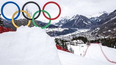 epa12708784 The Olympic rings are seen next to the Stelvio race track above the town of Bormio during the men's third official Alpine Skiing Downhill training at the 2026 Olympic Winter Games at the Stelvio Ski Center in Bormio, Italy, 06 February 2026.  EPA/MICHAEL BUHOLZER