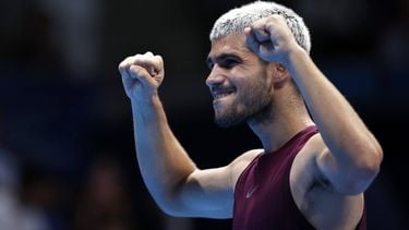 epa12416982 Carlos Alcaraz of Spain celebrates after winning the final match against Taylor Fritz of the USA at the Japan Open tennis tournament in Tokyo, Japan, 30 September 2025.  EPA/KIYOSHI OTA