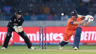 2023-10-09 15:20:18 Netherlands' Colin Ackermann (R) plays a shot during the 2023 ICC Men's Cricket World Cup one-day international (ODI) match between New Zealand and Netherlands at the Rajiv Gandhi International Stadium in Hyderabad on October 9, 2023. 
Noah SEELAM / AFP