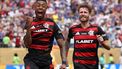 Flamengo's Brazilian forward #27 Bruno Henrique (L) celebrates next to teammate Brazilian defender #04 Leo Pereira after scoring his team's first goal during the FIFA Club World Cup 2025 Group D football match between Brazil's CR Flamengo and England's Chelsea at the Lincoln Financial Field stadium in Philadelphia on June 20, 2025. 
FRANCK FIFE / AFP