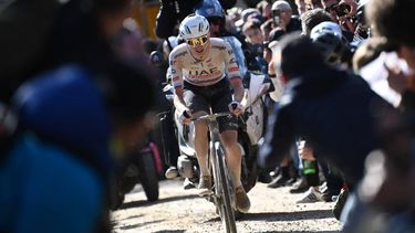Slovenian Tadej Pogacar, Team UAE, races ahead during the 18th one-day classic 'Strade Bianche' (White Roads) cycling race between Siena and Siena, Tuscany, on March 2, 2024. 
Marco BERTORELLO / POOL / AFP
