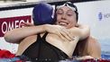 epa11775482 Gretchen Walsh (R) of the US smiles after she came in first in the semifinal of women's 100m butterfly of the World Aquatics Swimming Championships in Budapest, Hungary, 13 December 2024.  EPA/Robert Hegedus HUNGARY OUT