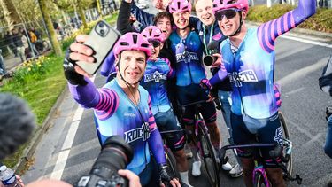 Netherlands' Dylan Groenewegen of Unibet Rose Rockets (L) takes a selfie with teammates  after winning the 'Ronde van Brugge' men's elite one-day cycling race, 202,9 km from and to Bruges on March 25, 2026. 
ELIAS ROM / Belga / AFP