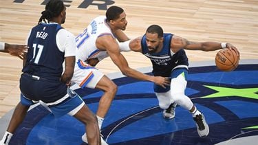 epa12133141 Minnesota Timberwolves guard Mike Conley (R) tries to get past Oklahoma City Thunder guard Aaron Wiggins (C) as Minnesota Timberwolves center Naz Reid (L) sets a pick during the first half of game three of the NBA Western Conference finals between the Oklahoma City Thunder and the Minnesota Timberwolves at the Target Center in Minneapolis, Minnesota, USA, 24 May 2025.  EPA/CRAIG LASSIG  SHUTTERSTOCK OUT