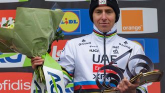 epa12049377 First placed Slovenian cyclist Tadej Pogacar of UAE Team Emirates XRG poses on the podium for the La Fleche Wallonne one-day cycling classic race for Elite Men over 205,2 km from Ciney to Huy, Belgium, 23 April 2025.  EPA/OLIVIER MATTHYS
