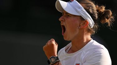 Czech Republic's Barbora Krejcikova celebrates winning the second set against Kazakhstan's Elena Rybakina during their women's singles semi-final tennis match on the eleventh day of the 2024 Wimbledon Championships at The All England Lawn Tennis and Croquet Club in Wimbledon, southwest London, on July 11, 2024. 
ANDREJ ISAKOVIC / AFP