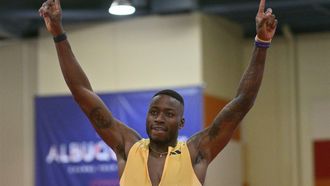 (FILES) Grant Holloway celebrates after setting a world record in the first round of the Men's 60m Hurdles during the 2024 USATF Indoor Championships at the Albuquerque Convention Center on February 16, 2024 in Albuquerque, New Mexico.  Hurdles king Grant Holloway set a new world record as he blasted into the final of the 60-meter hurdles at the US Indoor Championships in New Mexico on February 16, 2024.
Sam Wasson / GETTY IMAGES NORTH AMERICA / AFP