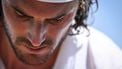 Greece's Stefanos Tsitsipas reacts as he plays against France's Valentin Royer during their men's singles first round tennis match on the first day of the 2025 Wimbledon Championships at The All England Lawn Tennis and Croquet Club in Wimbledon, southwest London, on June 30, 2025. 
Kirill KUDRYAVTSEV / AFP