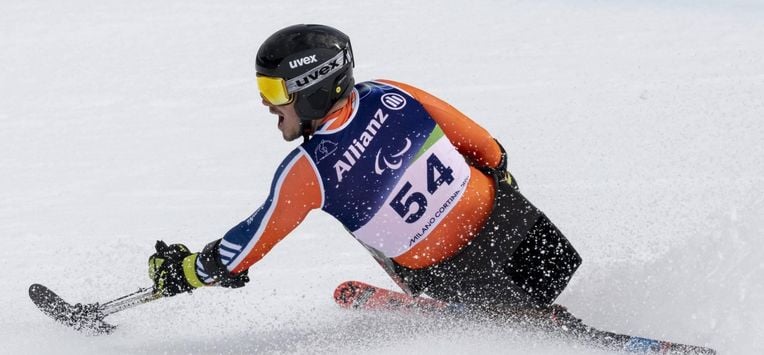 epa12807264 Netherlands' Jeroen Kampschreur in action during the Men's Para Ski Alpin Super-G race at the Milano Cortina 2026 Paralympic Winter Games in Cortina d'Ampezzo, Italy, 09 March 2026.  EPA/CLAUDIO THOMA   EDITORIAL USE ONLY