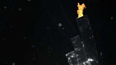 The flame is seen moments before being turned off in the cauldron during the closing ceremony of the 2022 Asian Games at the Hangzhou Olympic Sports Centre Stadium in Hangzhou in China's eastern Zhejiang province on October 8, 2023. 
Philip FONG / AFP